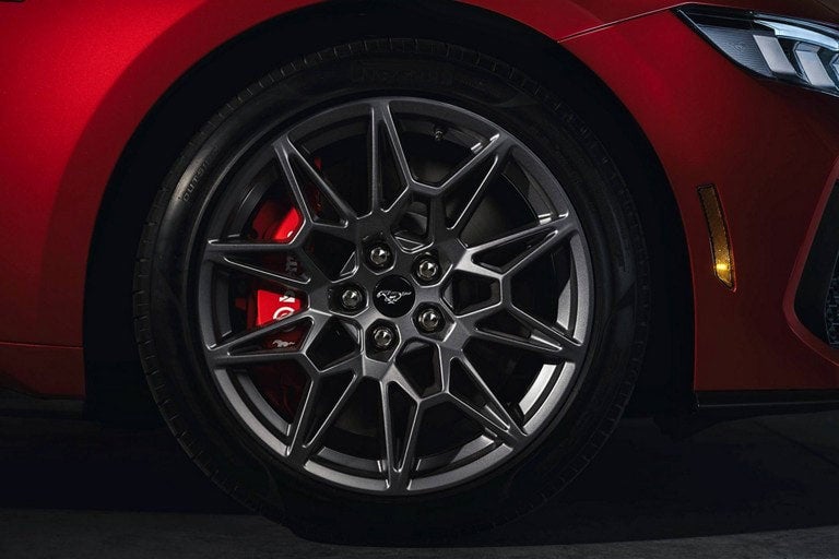2024 Ford Mustang® model with a close-up of a wheel and brake caliper | Griffin Ford Fort Atkinson in Fort Atkinson WI